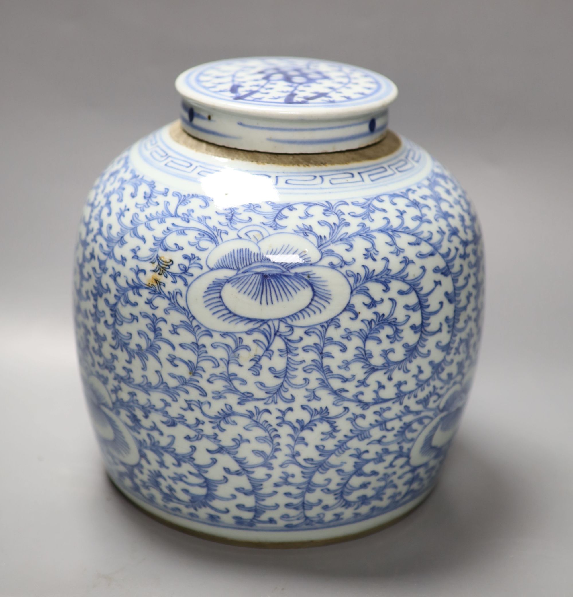 A 19th century Chinese blue and white jar, with associated cover, height 22cm